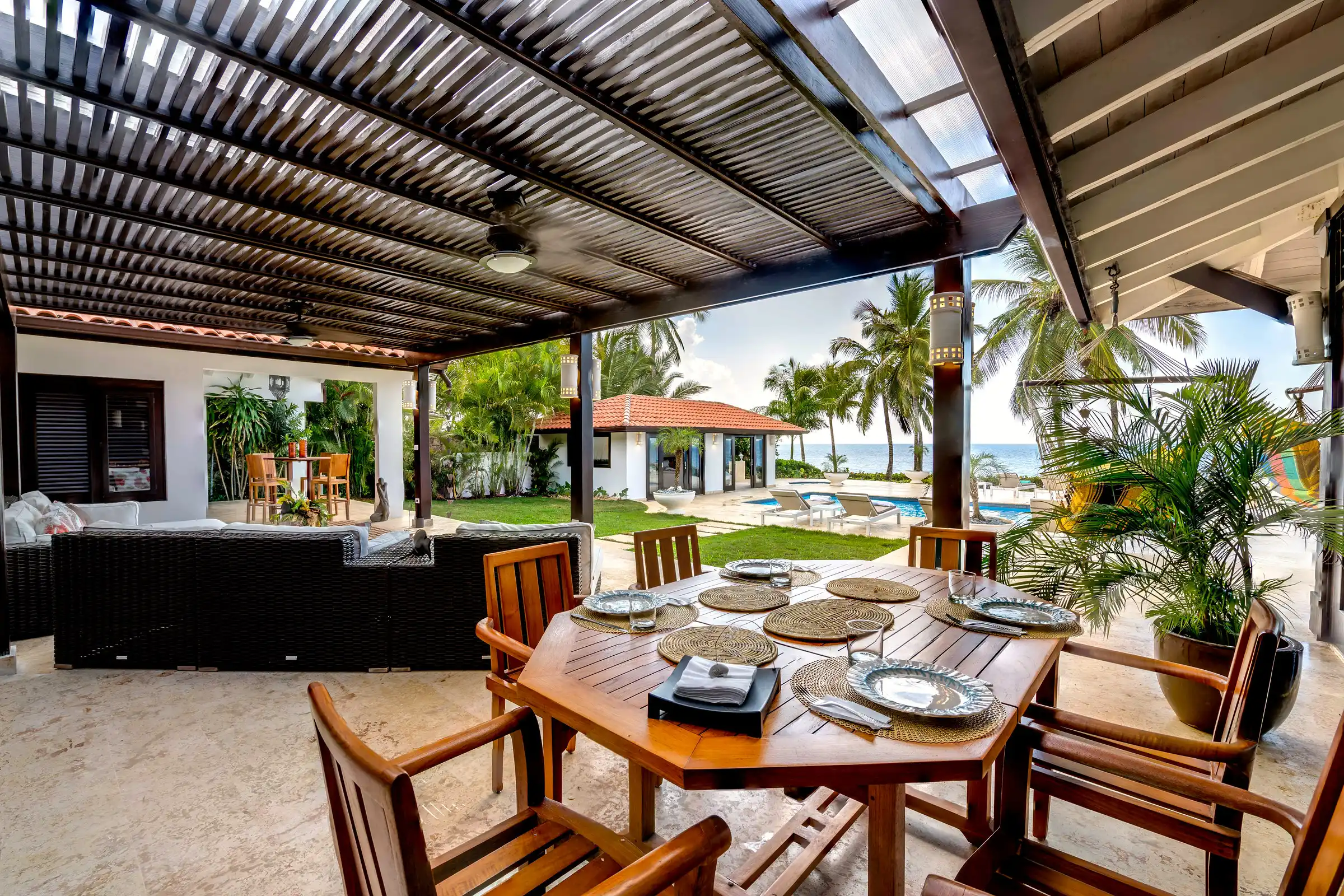 Al-fresco dining terrace at Costa Verde 3, the table set and facing the sea